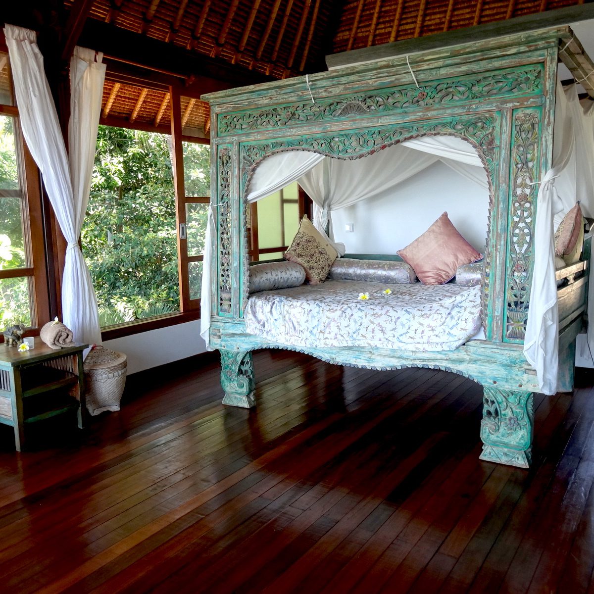 Sunrise Room with a cozy, traditional bed