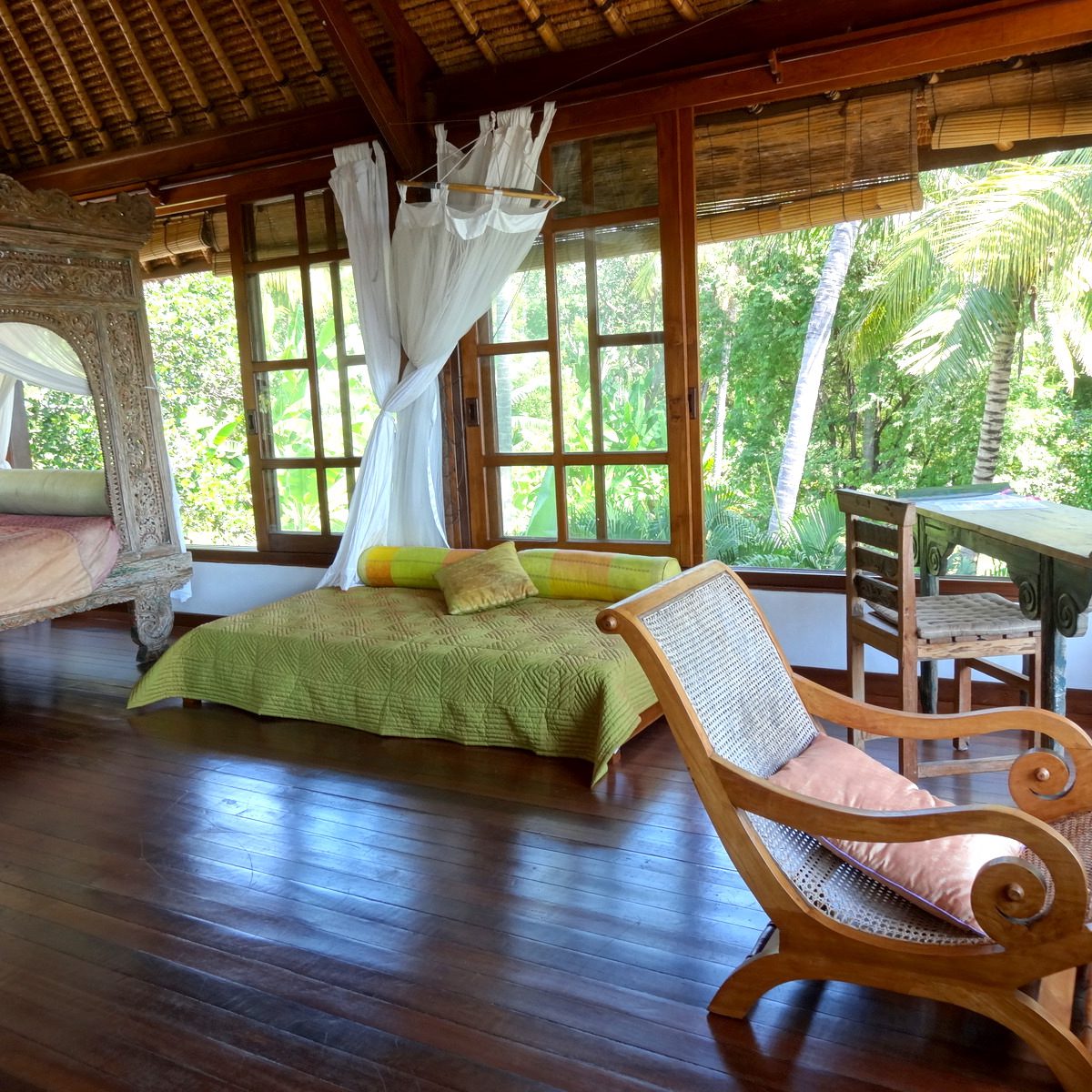 Sunset Room with one big bed and one single bed